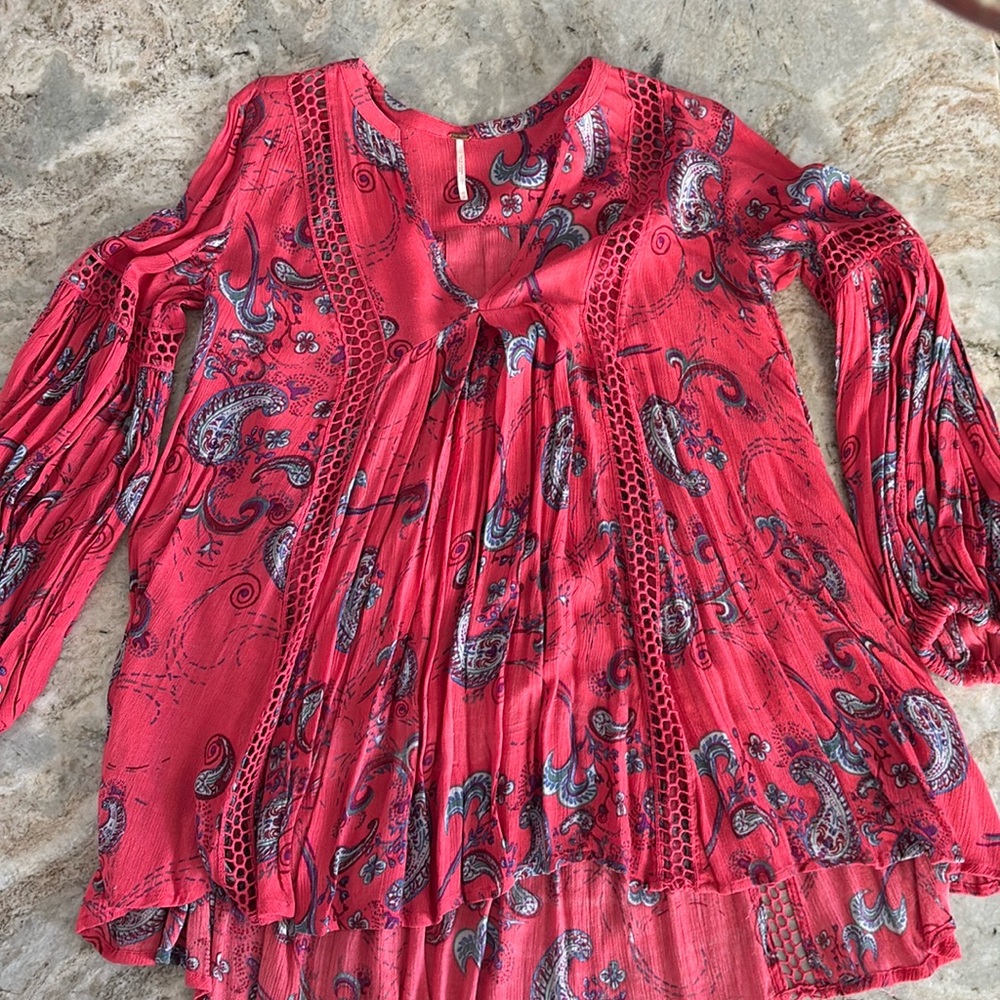 Free People Tunic with embroidery detail on the front and on the arms.